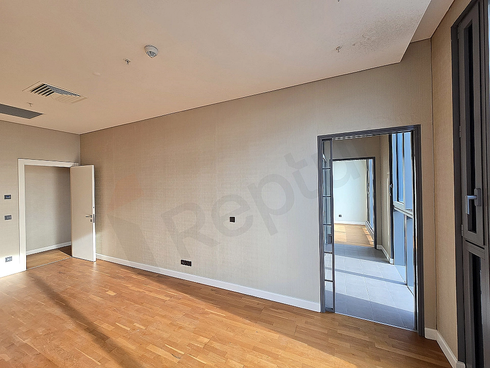 Modern bedroom interior, wooden floor, large window, and stylish decoration details