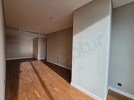 Modern designed, bright and spacious bedroom. Wide windows and stylish decoration details.