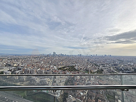 Panoramic view of a modern apartment with sea and city views in Sarıyer, Istanbul.