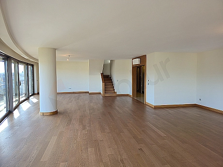 Modern designed, spacious and bright living room.