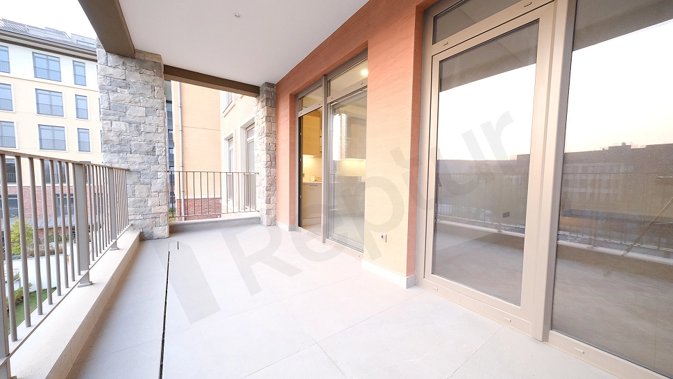 Image of a spacious apartment balcony.