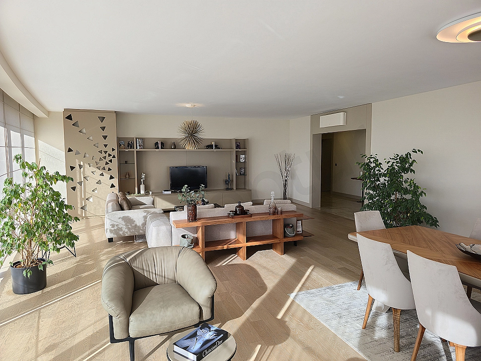 Stylish and modern living room design, large window, luxurious furniture, bright interior