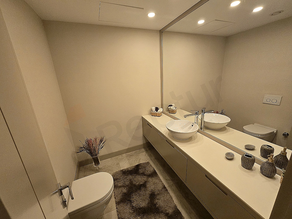 Modern designed, spacious and luxurious bathroom interior. Bright, airy, wooden details and stylish fixtures.