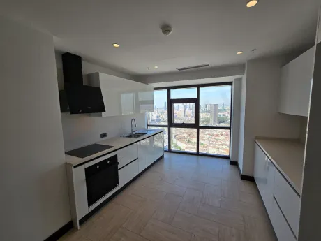 Modern and spacious kitchen area of the 3+1 luxury residence apartment in Sisli.