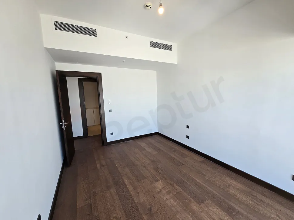 Modern and spacious bedroom design of a luxury residence apartment in Şişli.