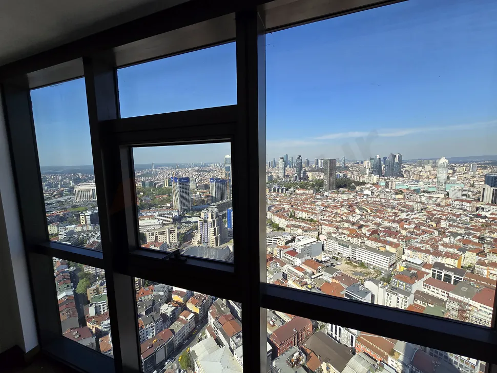 Panoramic city view of Istanbul Sisli from a high-rise luxury residence window.