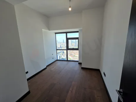 Interior view of a modern and spacious bedroom.