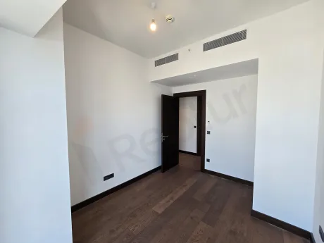Spacious and bright bedroom area of a modern residence apartment in Sisli.