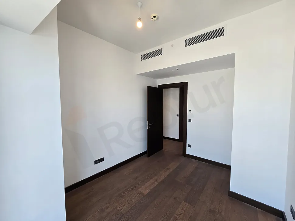 Spacious and bright bedroom area of a modern residence apartment in Sisli.