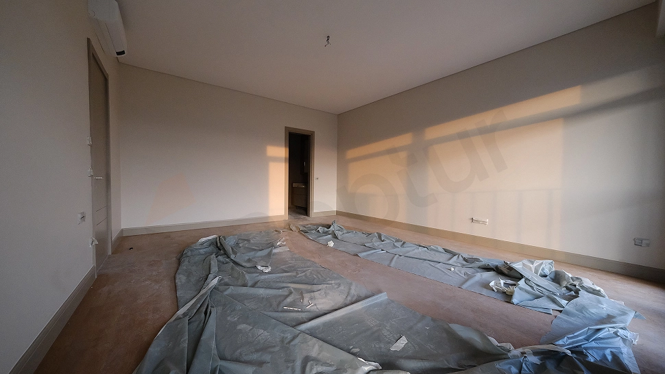 Image of a spacious and bright bedroom.