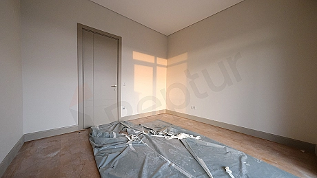 Image of a bright and spacious bedroom.