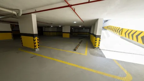 Secure and high-capacity open and covered parking area of the residential complex.