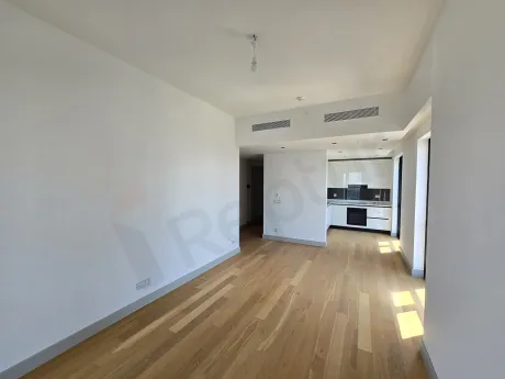 Spacious, bright living room area with city views in a modern residence apartment in Sisli.