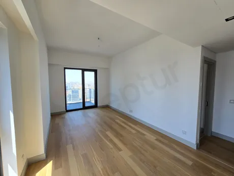 Interior view of a modern and spacious living room in a luxury residence apartment.