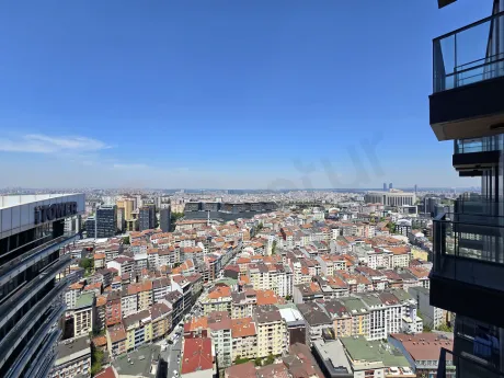 Modern and spacious balcony of a residence apartment in Sisli with a city view.