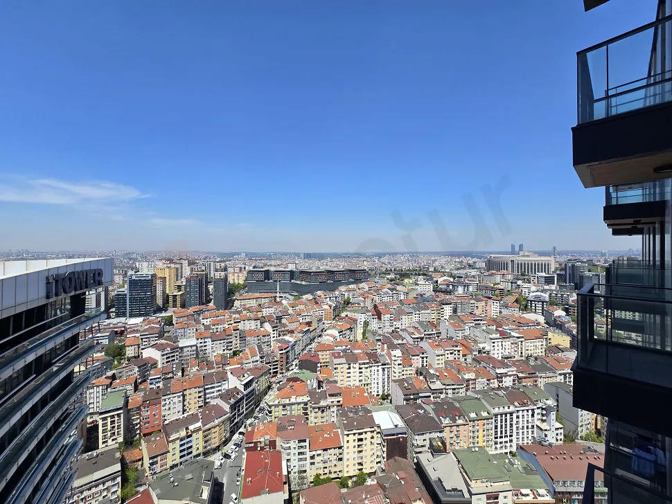 Modern and spacious balcony of a residence apartment in Sisli with a city view.