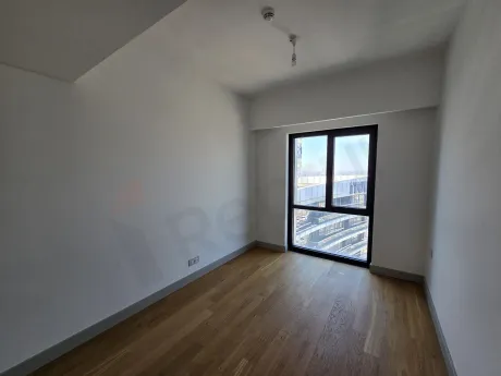 Interior view of a modern and spacious bedroom.