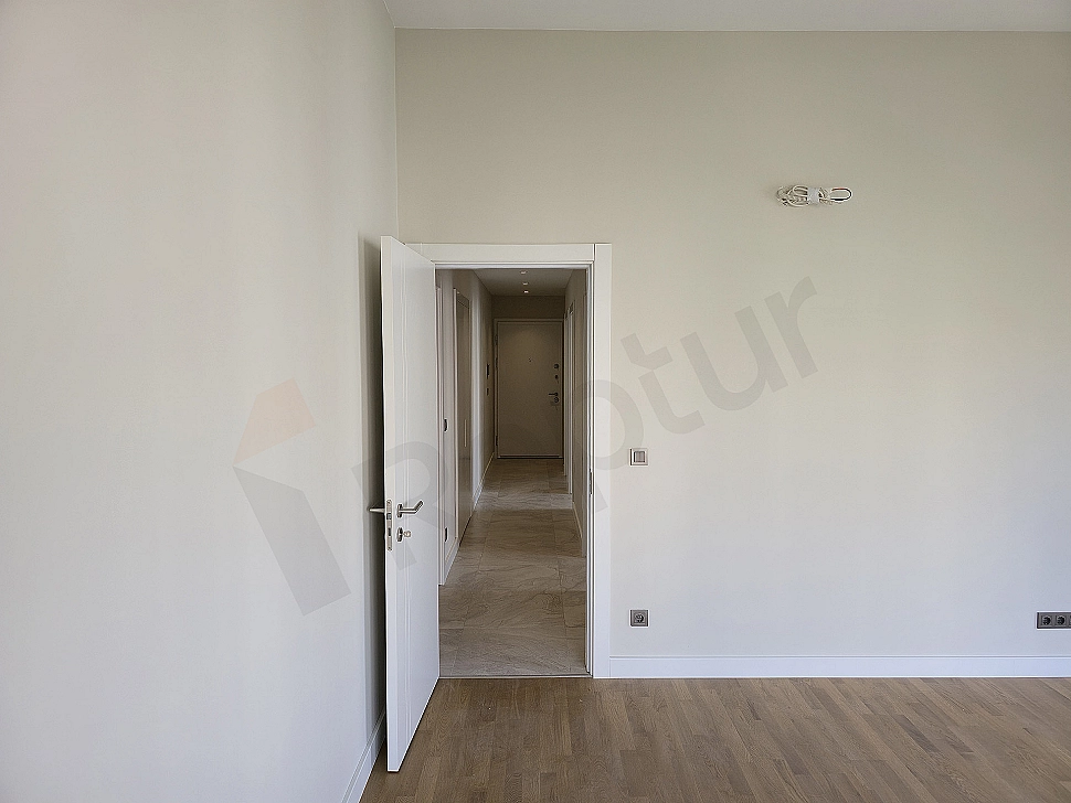 Modern living room interior, spacious windows and city view