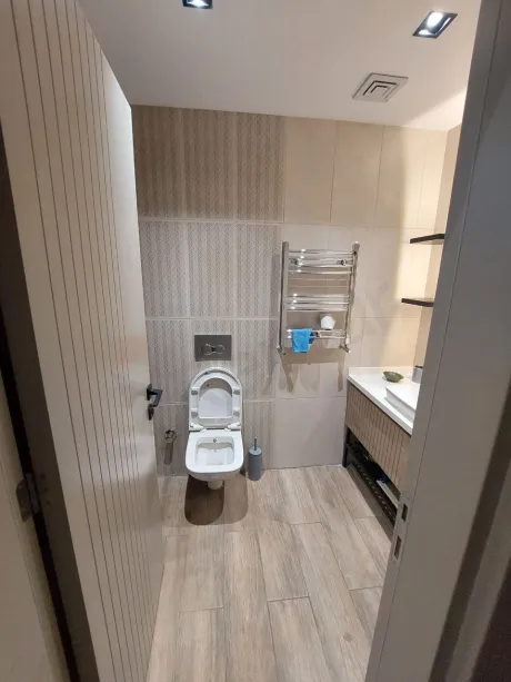 A spacious bathroom image with modern design, high-quality ceramics, and stylish sanitaryware.