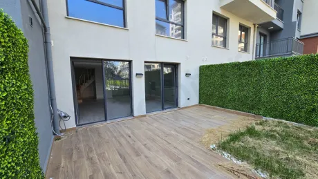 Spacious and airy terrace area of a modern duplex apartment.