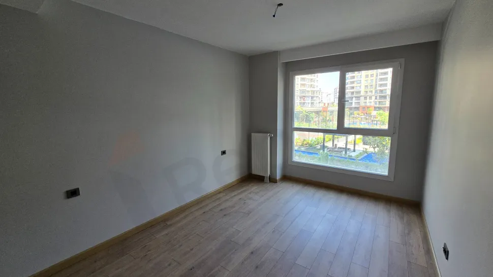 View of a spacious and bright modern bedroom in a newly built duplex apartment.