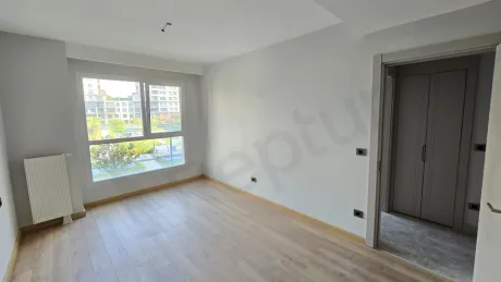 Modern and bright bedroom view with large windows in a luxury duplex apartment in Beylikdüzü.