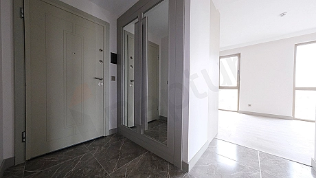 Apartment entrance door and hallway.