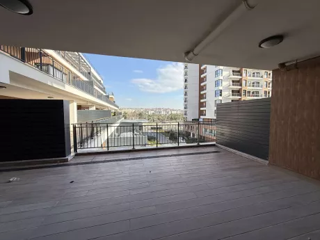 Spacious and wide terrace area of a modern apartment located in Cekmekoy, Istanbul.