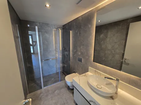 Modern and stylishly designed spacious bathroom interior.