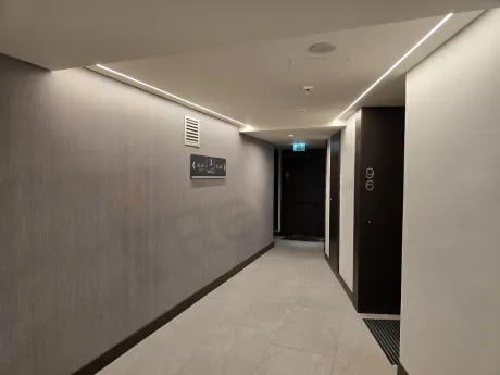 Spacious and elegantly designed lobby area of a modern luxury residence