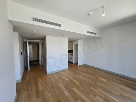 Modern interior staircase design and step details within a residential apartment.