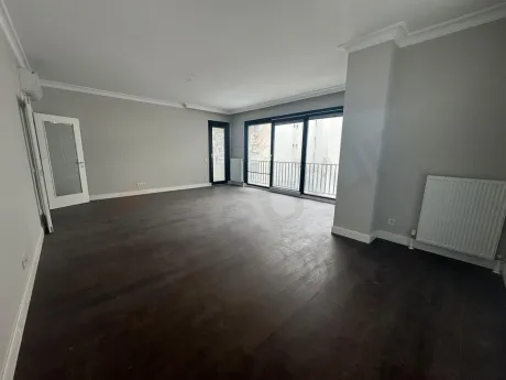 Spacious living room view of a modern and bright apartment.