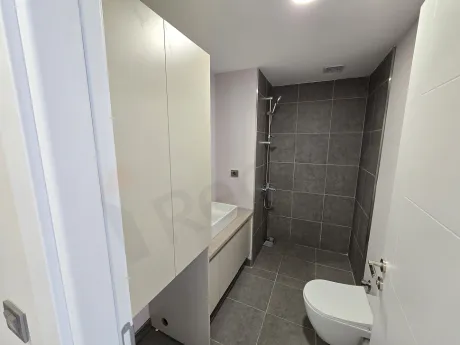 Interior view of a modern and stylishly designed newly built bathroom.