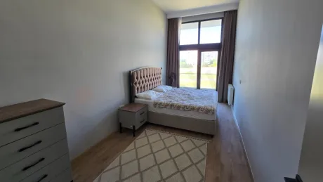 Spacious and bright bedroom area of a modern residence apartment in Beylikdüzü.