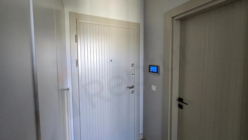 Spacious and bright corridor of a modern residence apartment in Beylikdüzü.