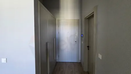 Spacious and bright hallway view of a modern residence apartment.