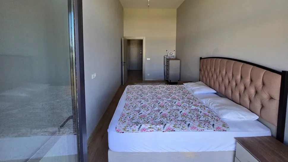 Modern and spacious bedroom interior.