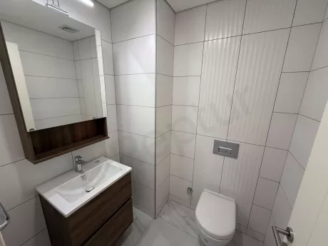 Stylish and spacious bathroom area with modern design.