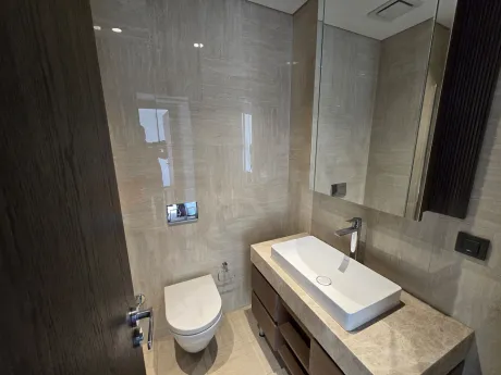 Modern bathroom design with stylish ceramic tiles and high-quality bathroom fixtures.