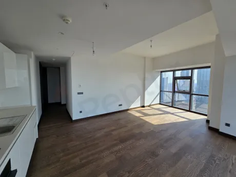 Spacious and bright living room of a modern residence apartment located in Sisli, Istanbul.