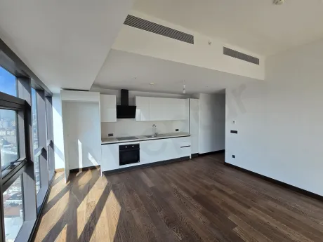 Spacious and bright open kitchen area with a modern design.