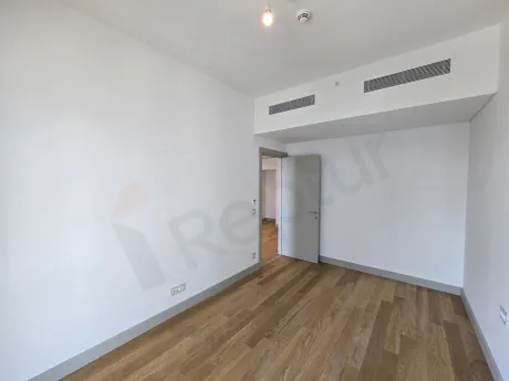 Modern and spacious bedroom area in a residence apartment in Sisli.