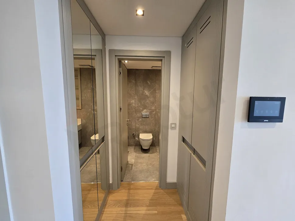 Modern luxury bathroom with elegant ceramic tiling and high-quality sanitary ware.