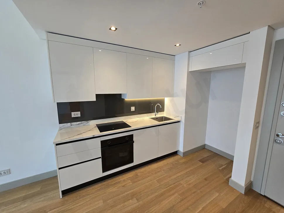 Spacious and bright kitchen area with a modern design.