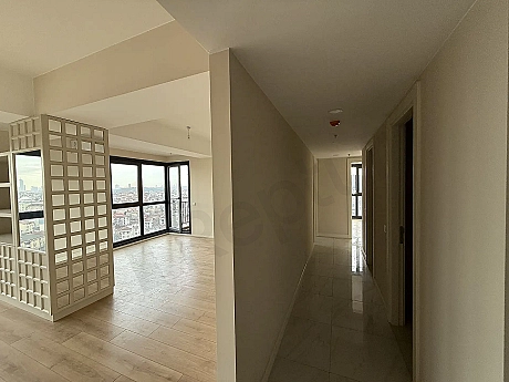 A modern and spacious bright apartment corridor view.