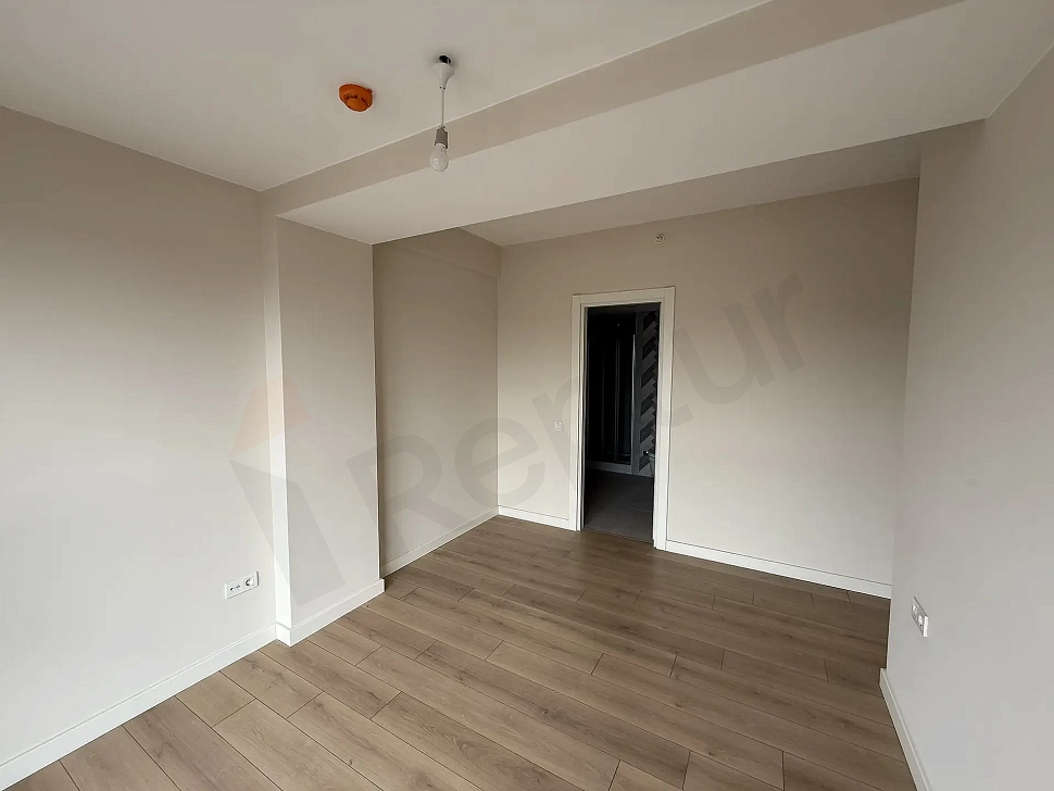 General view of a spacious and bright bedroom