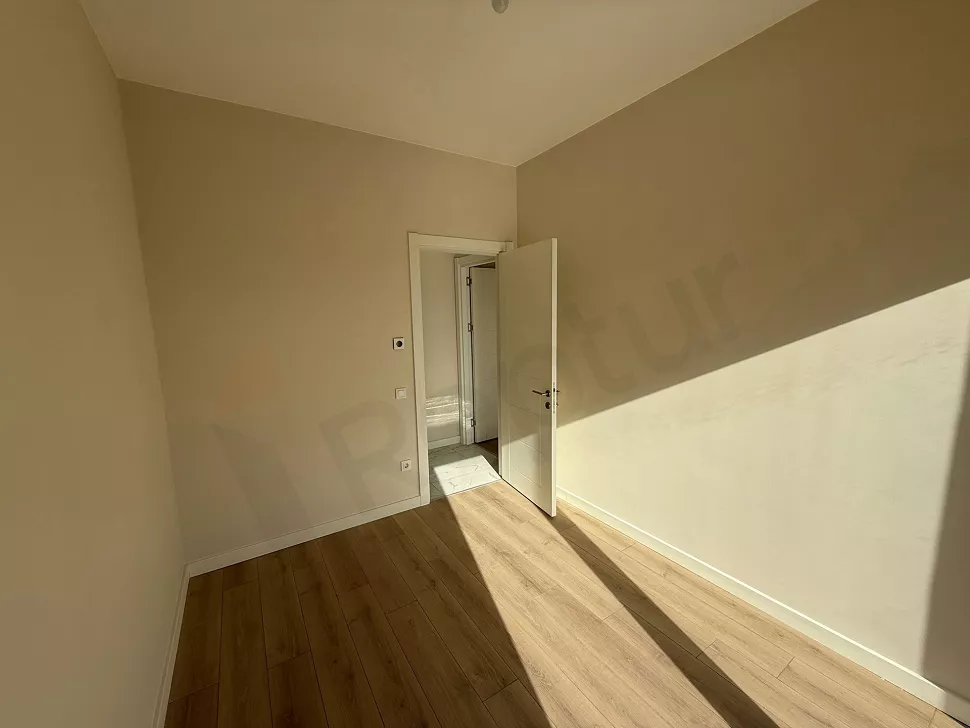 Modern and spacious bedroom view of an apartment for sale in Istanbul Cekmekoy.