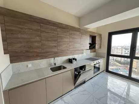 Bright kitchen design of a modern and spacious apartment.