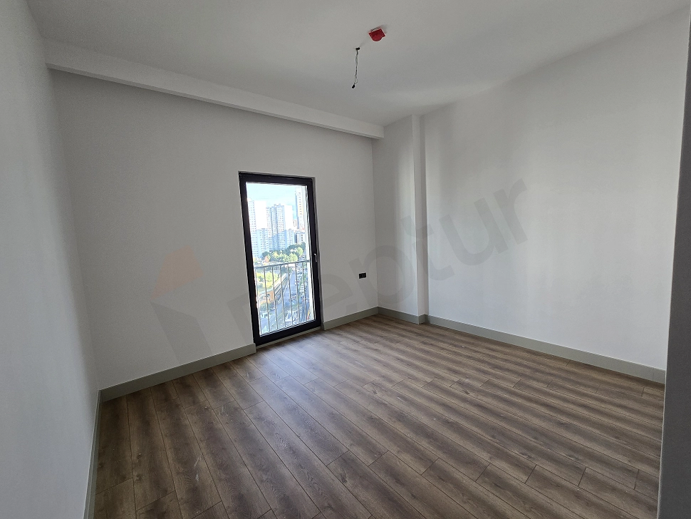 Photograph of a bright and spacious designed bedroom.