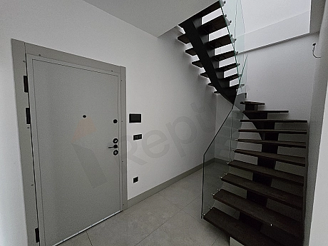 Interior view of wooden staircase.